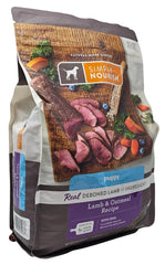 SIMPLY NOURISH kibble close-up demonstrates small size ideal for growing puppies.