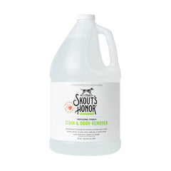 SKOUT'S HONOR Pet Stain and Odor Remover bottle pour demonstrates quick stain lift on carpets