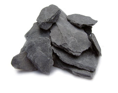 Small World Slate 1-3 inch stones forming aquascaping cliffs for realistic tanks.