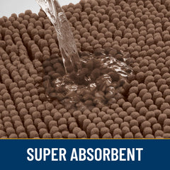 Smiry door mat low-profile design shown at doorway fits under most doors.