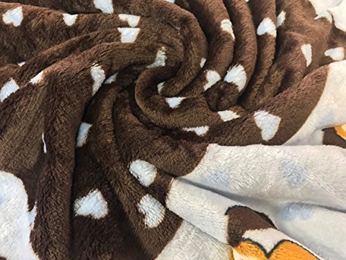 Snuggle Puppy blanket blue ideal for puppy growth comfort.