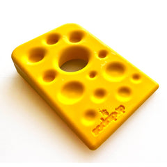 SodaPup Swiss Cheese Wedge indentations designed for stuffing treats during play.