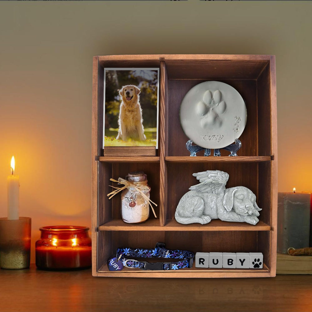 Sofunii Pet Memorial Shadow Box items arranged with paw prints and photos
