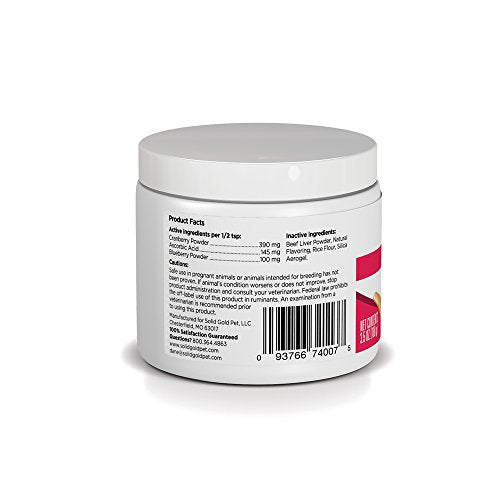 Solid Gold Berry Balance powder being sprinkled into a dog's meal for urinary support