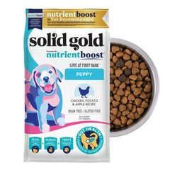 Solid Gold chicken dry puppy food bag closeup showing real chicken first ingredient