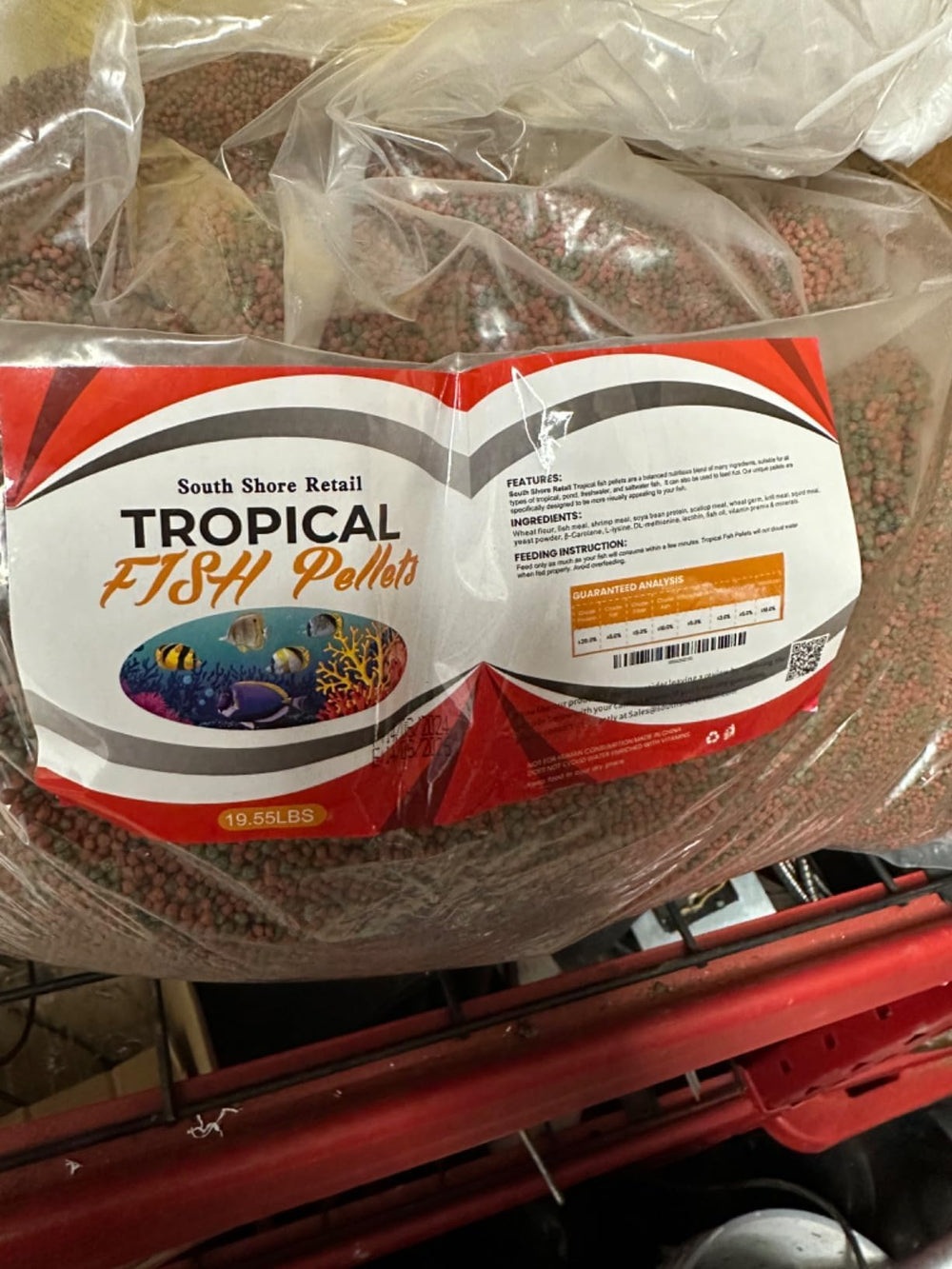 SOUTH SHORE RETAIL koi feeding scene emphasizes color-enhancing formula