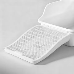 SpaceTime elevated litter mat with double-layer trapping to reduce tracking.
