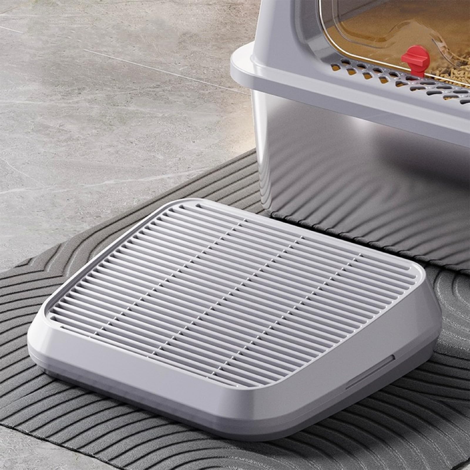 SpaceTime elevated cat litter mat ramp-entry shows easy access for senior cats.