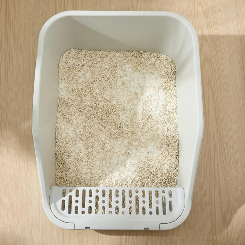 SpaceTime kitty using litter box showing user-friendly setup