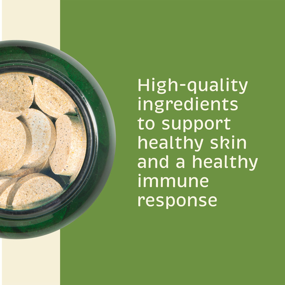Spirited Paw Skin + Allergy chew in dog’s mouth suggesting coat health benefits.