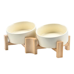 SPUNKYJUNKY tilted bowl beige stand eases feeding for short-nosed pets.