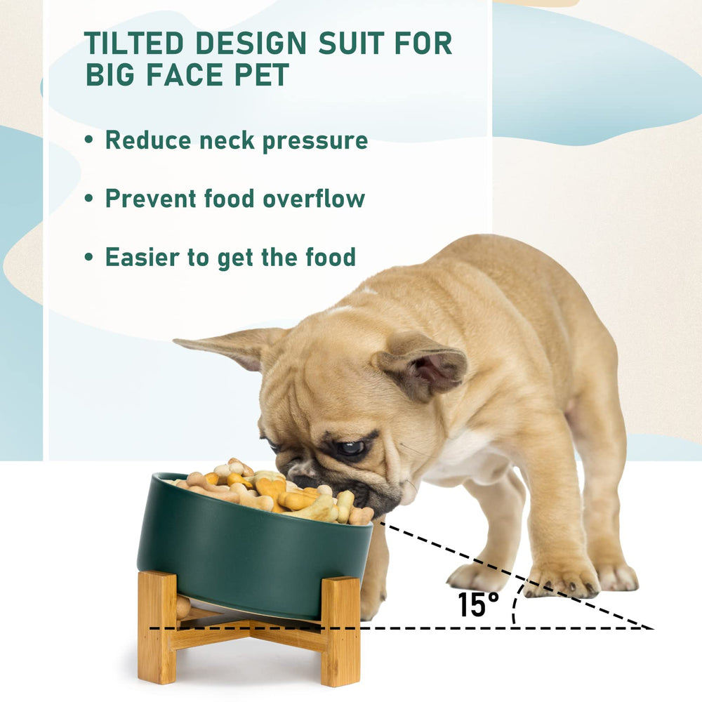 SPUNKYJUNKY wooden stand supports the green ceramic bowl with a non-slip base.