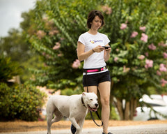 Squishy Face Studio hands-free walking neon pink demonstrates secure belt around waist for stable leash control.