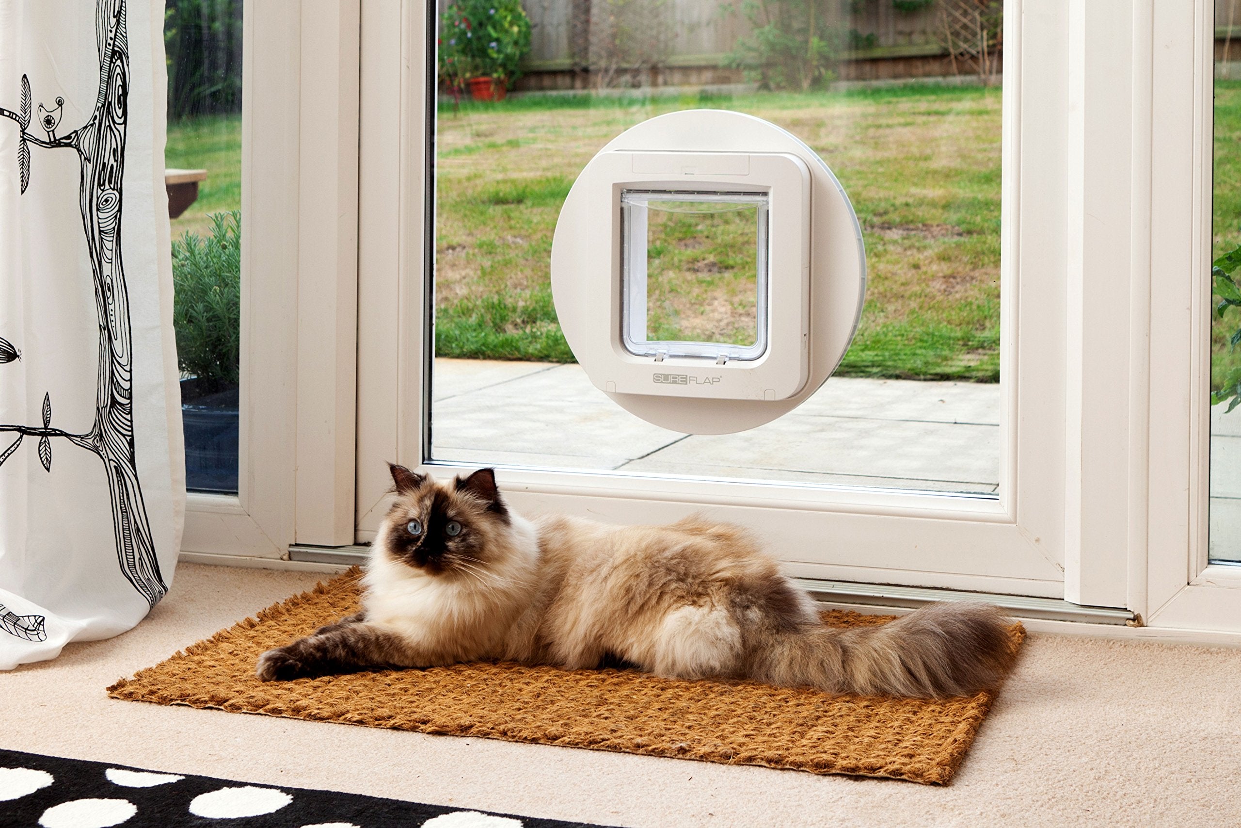 SureFlap Microchip Pet Door white installation kit demonstrates setup