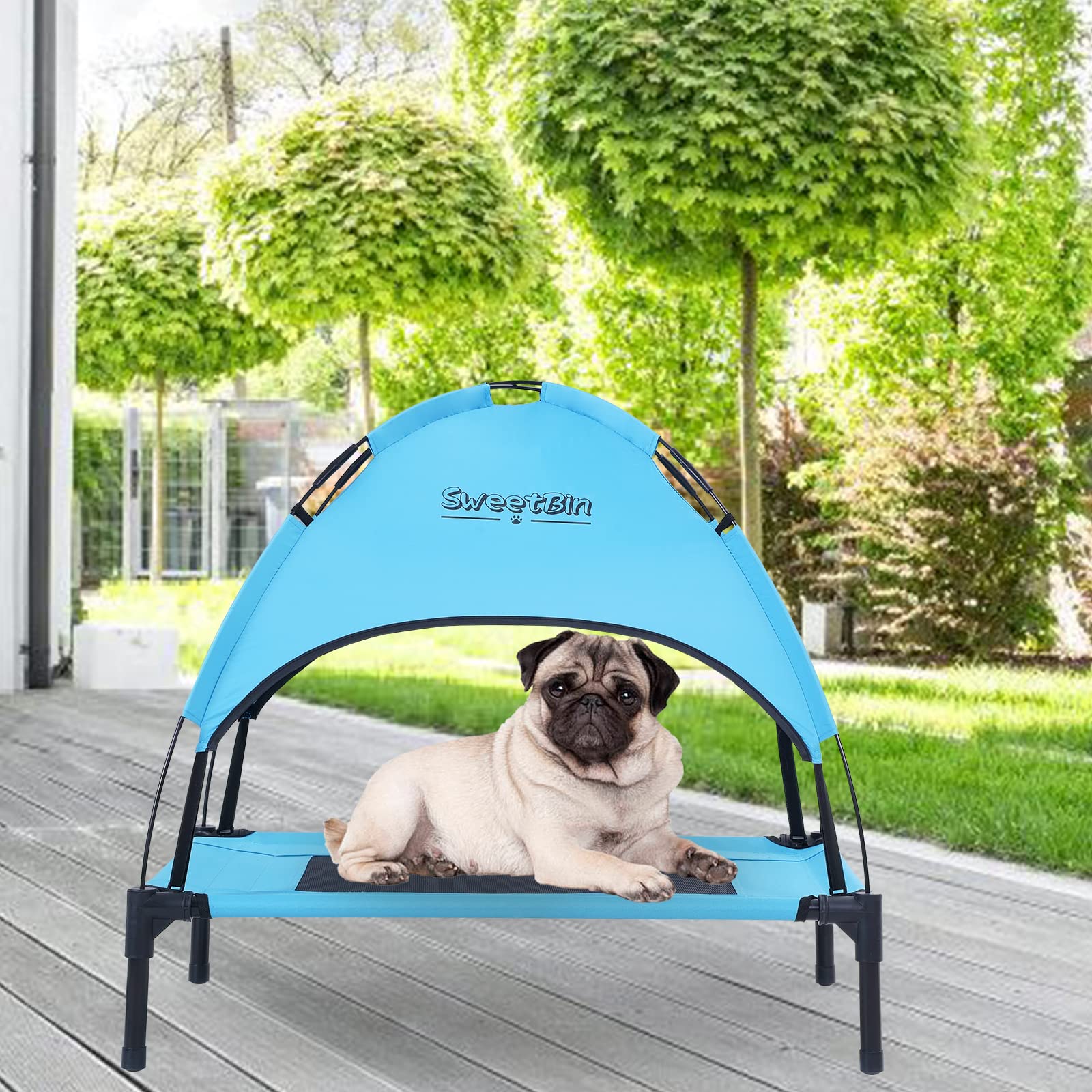 SweetBin outdoor elevated dog cot with canopy offers shaded comfort for camping.