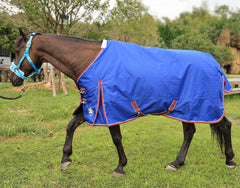 T TEKE Deluxe Turnout Blanket back-tail flap provides full coverage during movement.