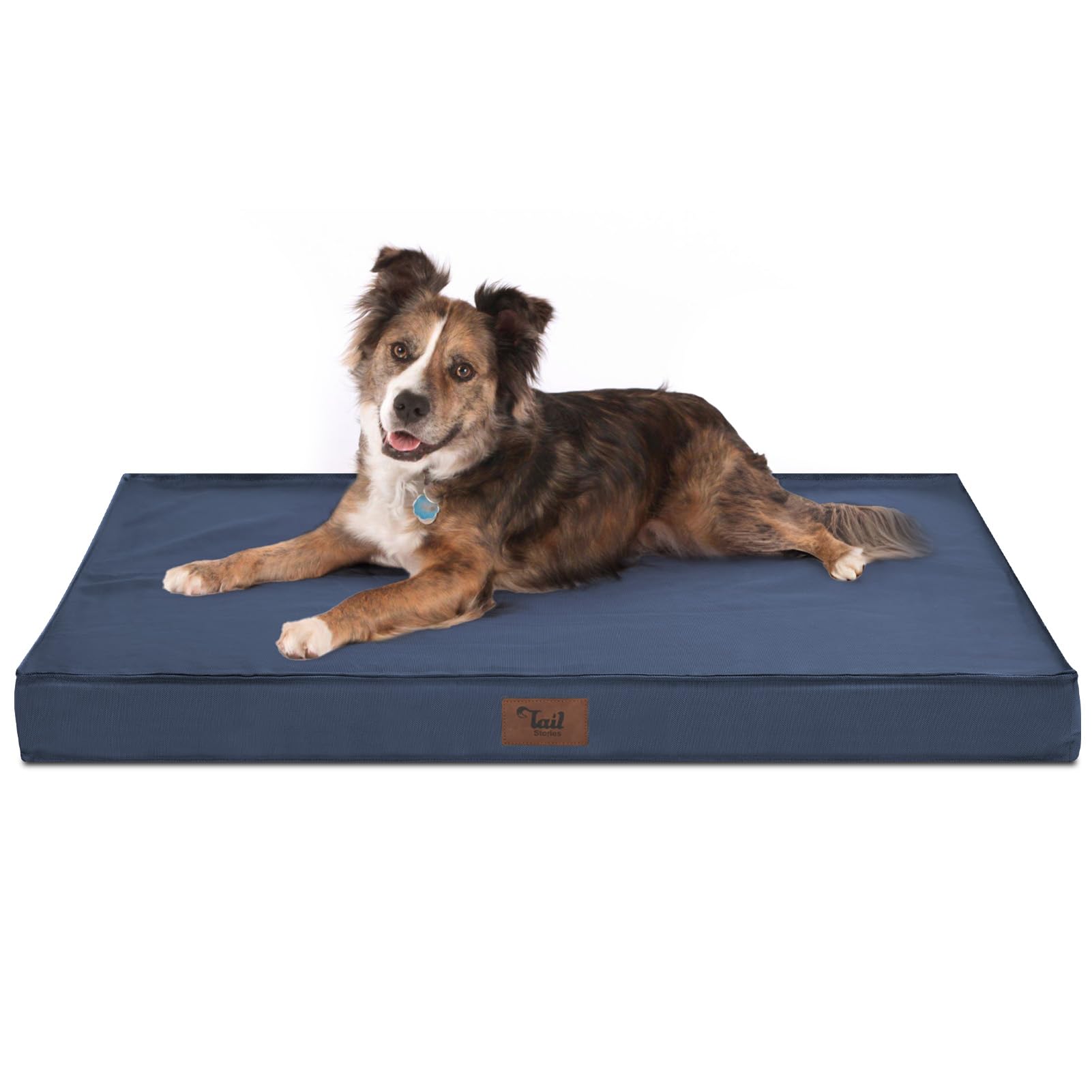 Tail Stories large outdoor dog bed in navy with waterproof Oxford cover for outdoor lounging.