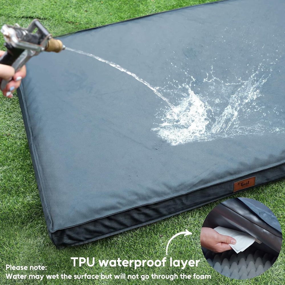 Tail Stories Outdoor Dog Bed blue outdoor-ready design with carrying handle for travel.