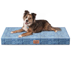 Tail Stories outdoor orthopedic dog bed with egg crate foam for joint support during naps outside.