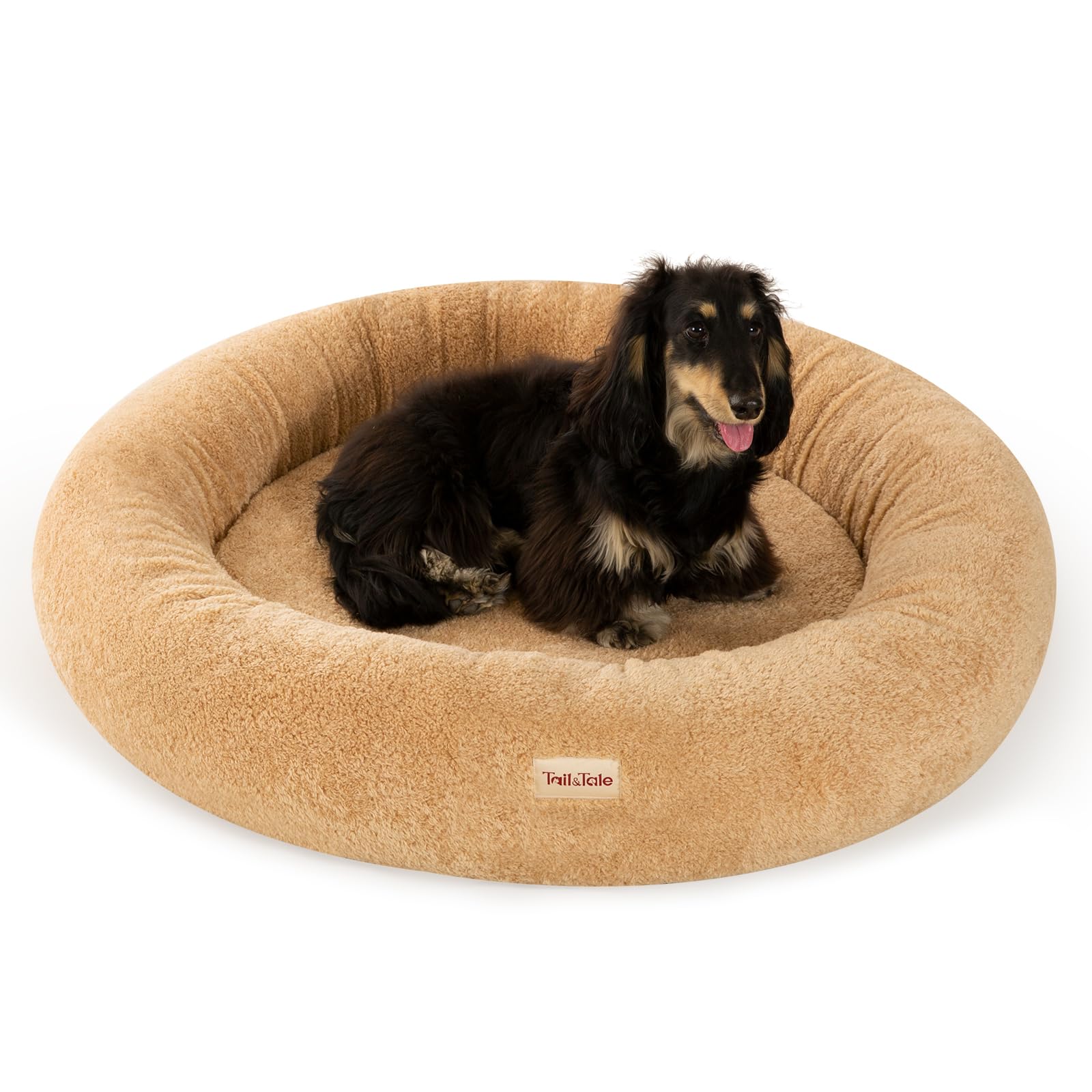 Tail&Tale self-warming donut bed top view highlighting calming circular design for anxious dogs
