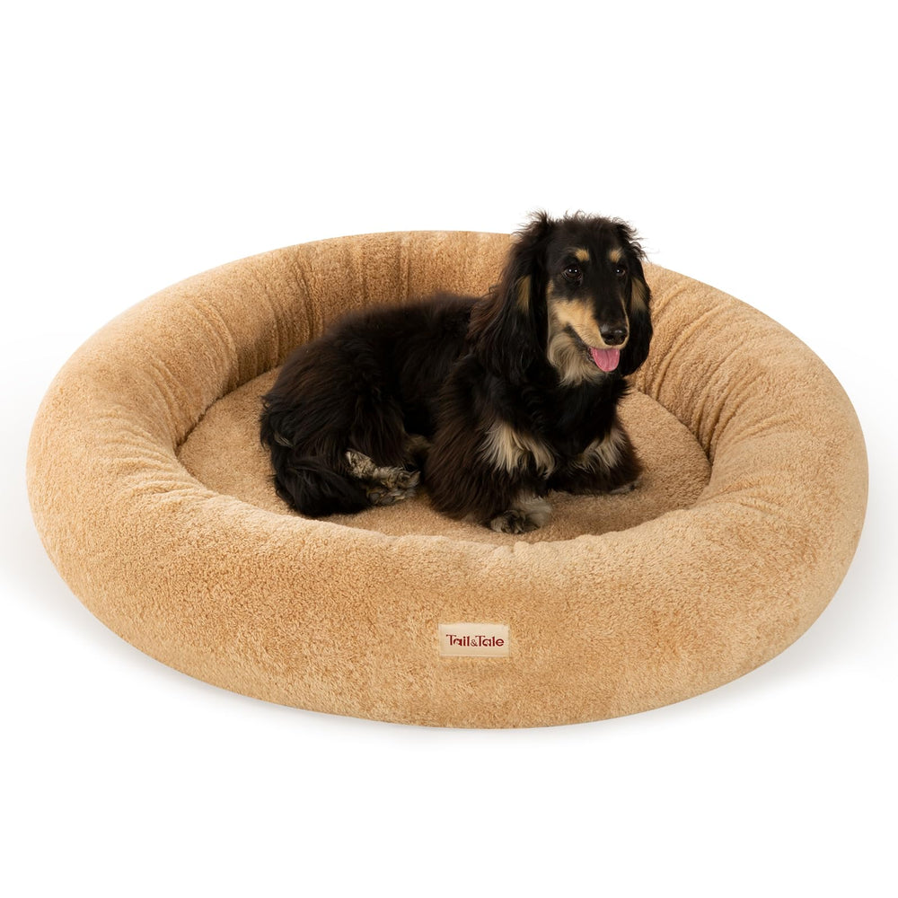 Tail&Tale self-warming donut bed top view highlighting calming circular design for anxious dogs
