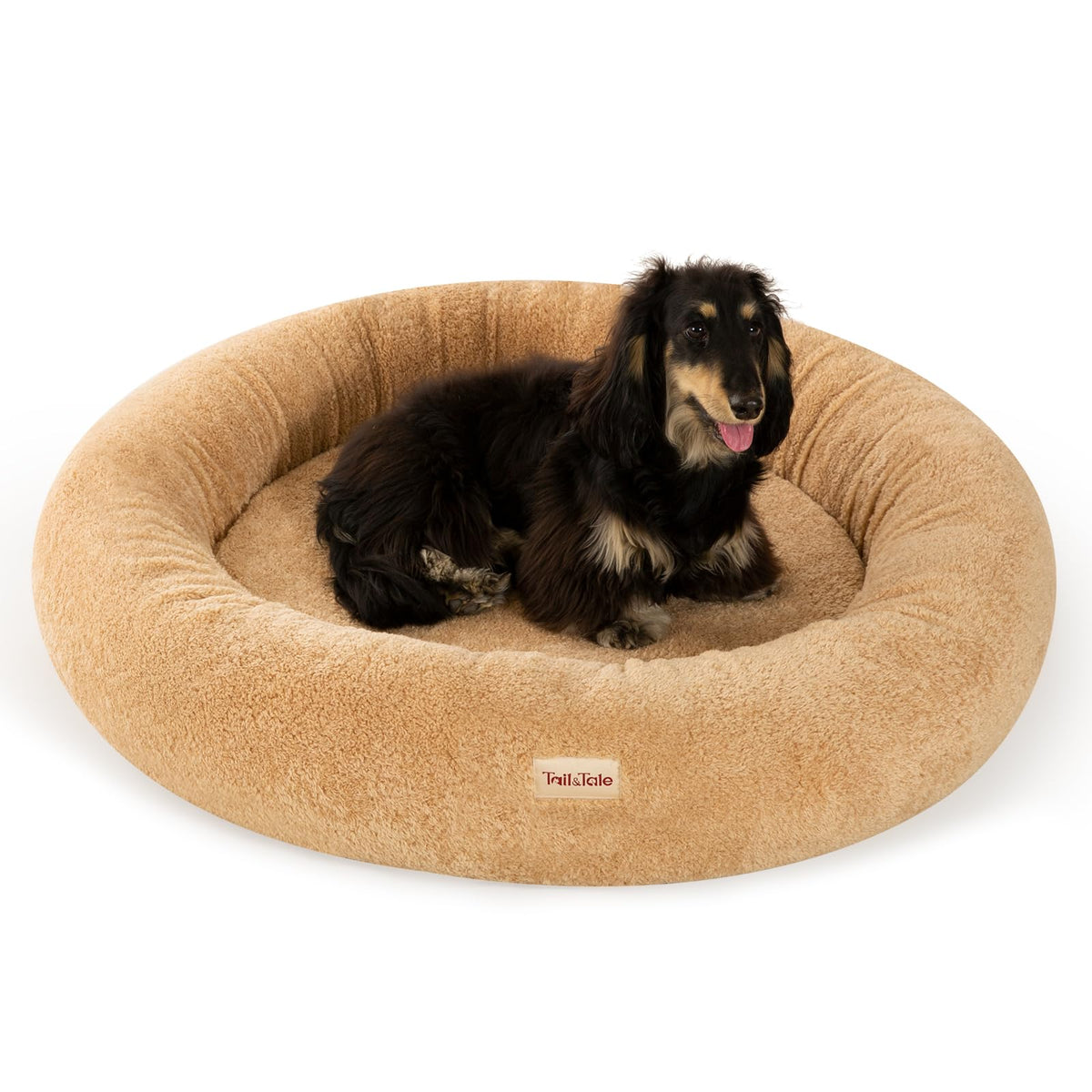 Tail&Tale self-warming donut bed top view highlighting calming circular design for anxious dogs