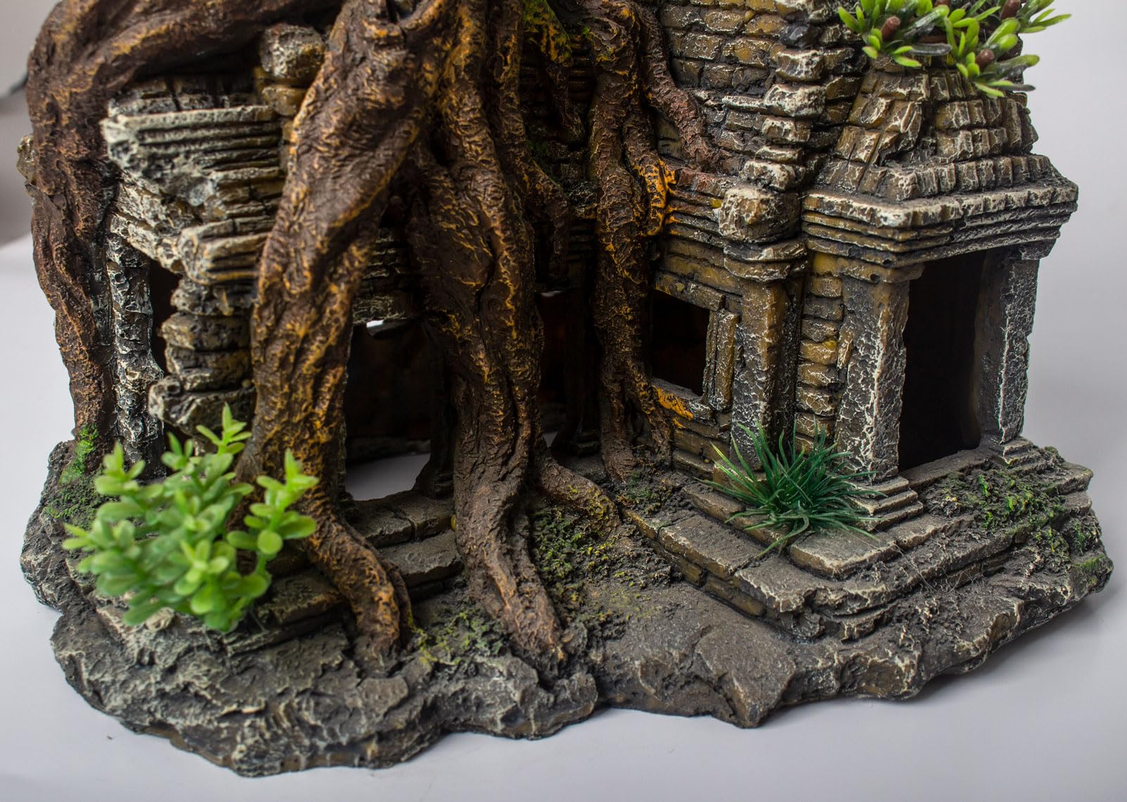 TAOMYPETS resin durable sculpture withstands daily fish activity for long-lasting decor.