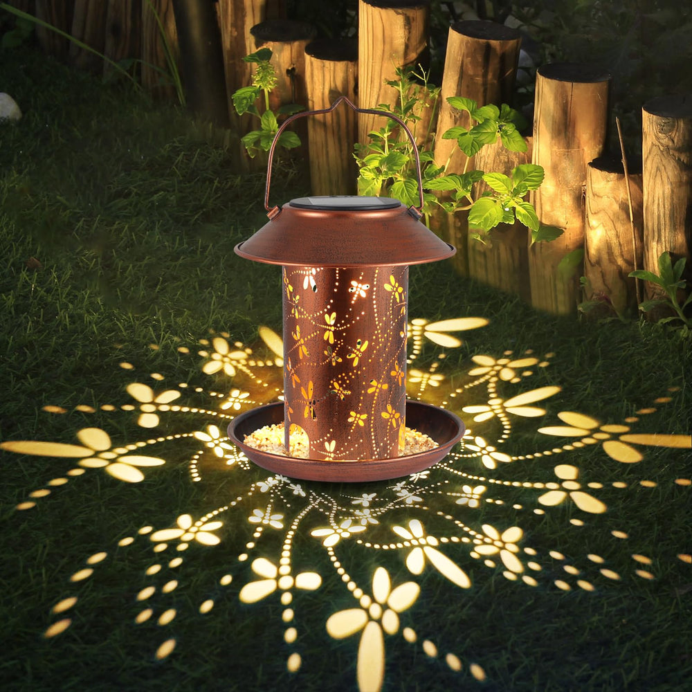 Tepaken dragonfly lantern bird feeder hanging from a tree for outdoor decor.