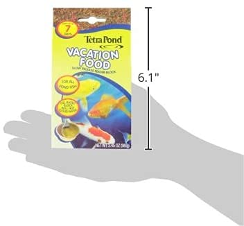 TetraPond Vacation Food Block in an aquarium scene with feeding indication.