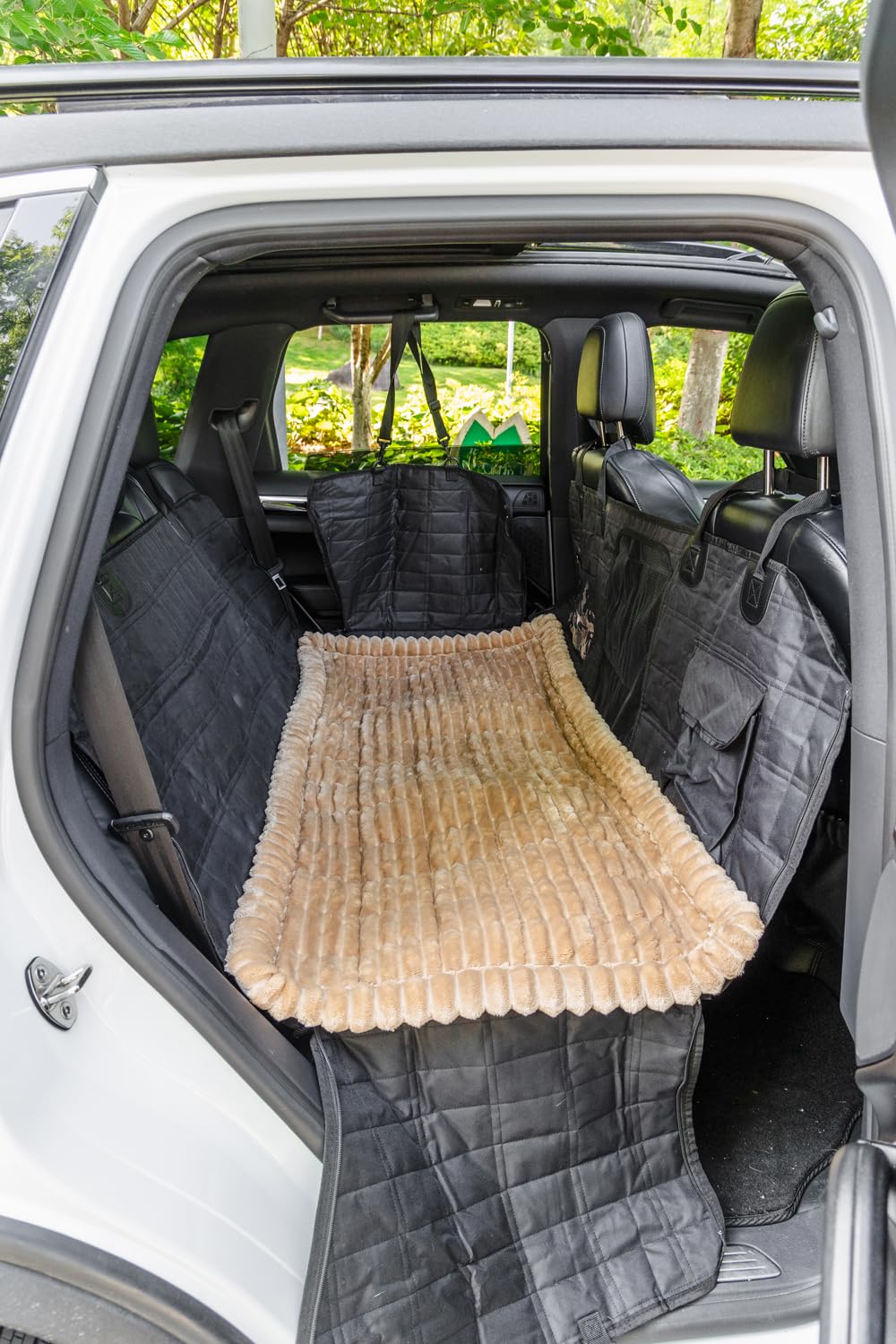 TGODGPY dense flannel backseat mat provides plush warmth and comfort for traveling dogs.