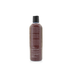 The Coat Handler clarifying dog shampoo closeup label highlights natural ingredients and biodegradable formula