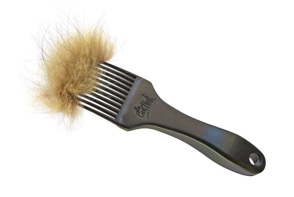 The CoatHook deshedding tool cat grooming scene demonstrates gentle detangling.