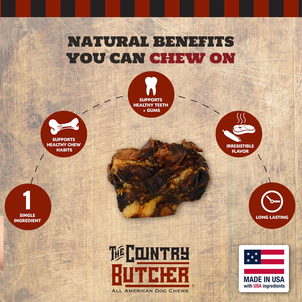 The Country Butcher beef knuckle dog bones on a table for large dogs' satisfying chew.