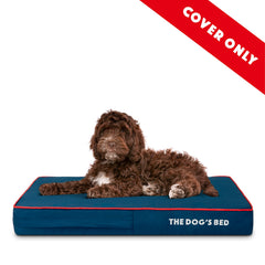 The Dog's Balls replacement outer cover on bed — durable, long-lasting comfort.