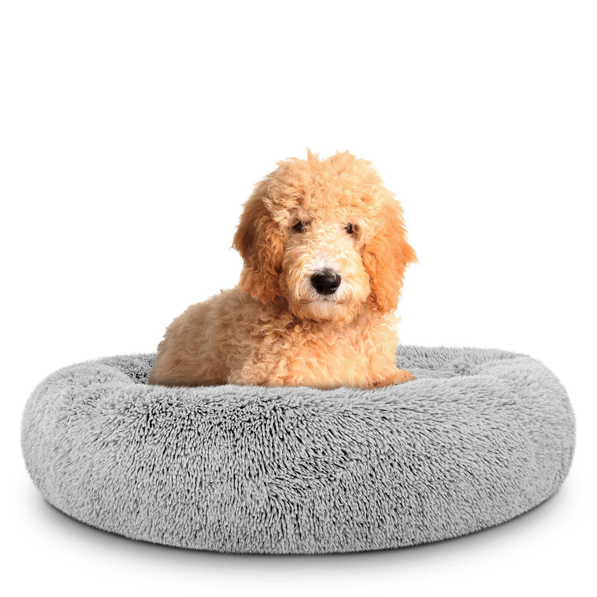 The Dog's Bed Sound Sleep round exterior shows plush vegan fur for cozy nesting comfort.