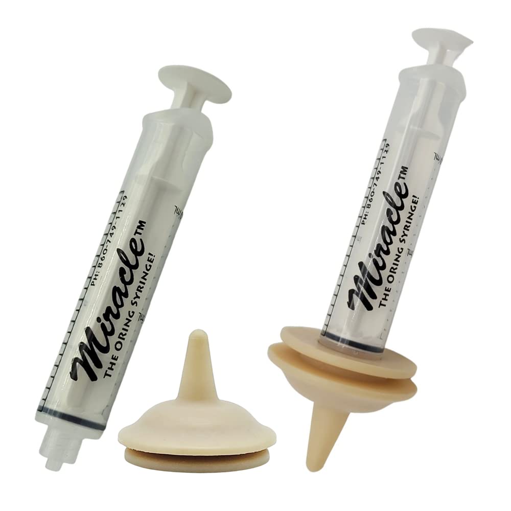 The Miracle Nipple base kneading pad demonstrates soothing paw knead during feeding.