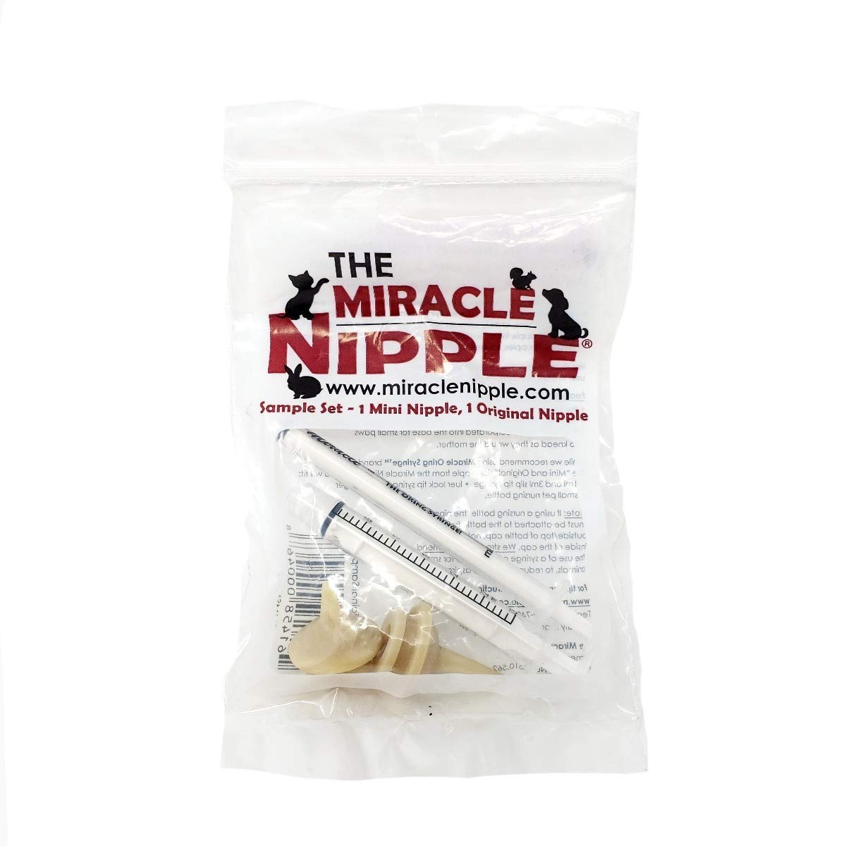 The Miracle Nipple sample set in use demonstrating kit with syringes for precise feeds.