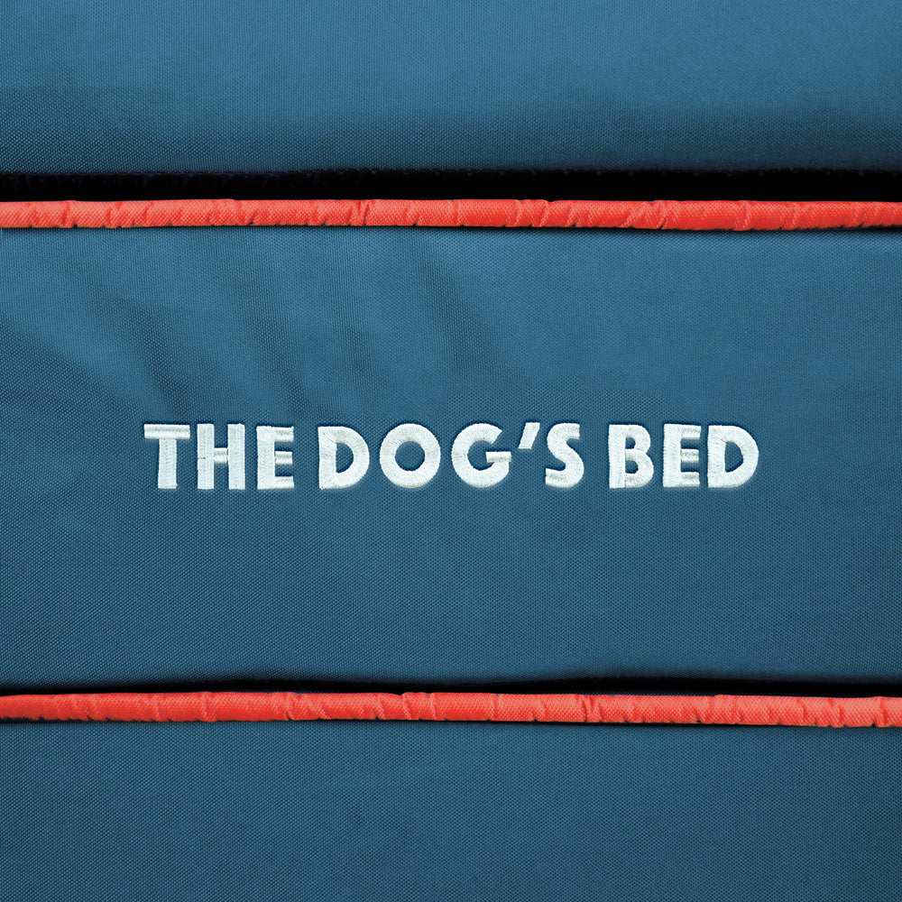 The Dog's Balls blue cover with UK flag embroidery adds a stylish protective layer.