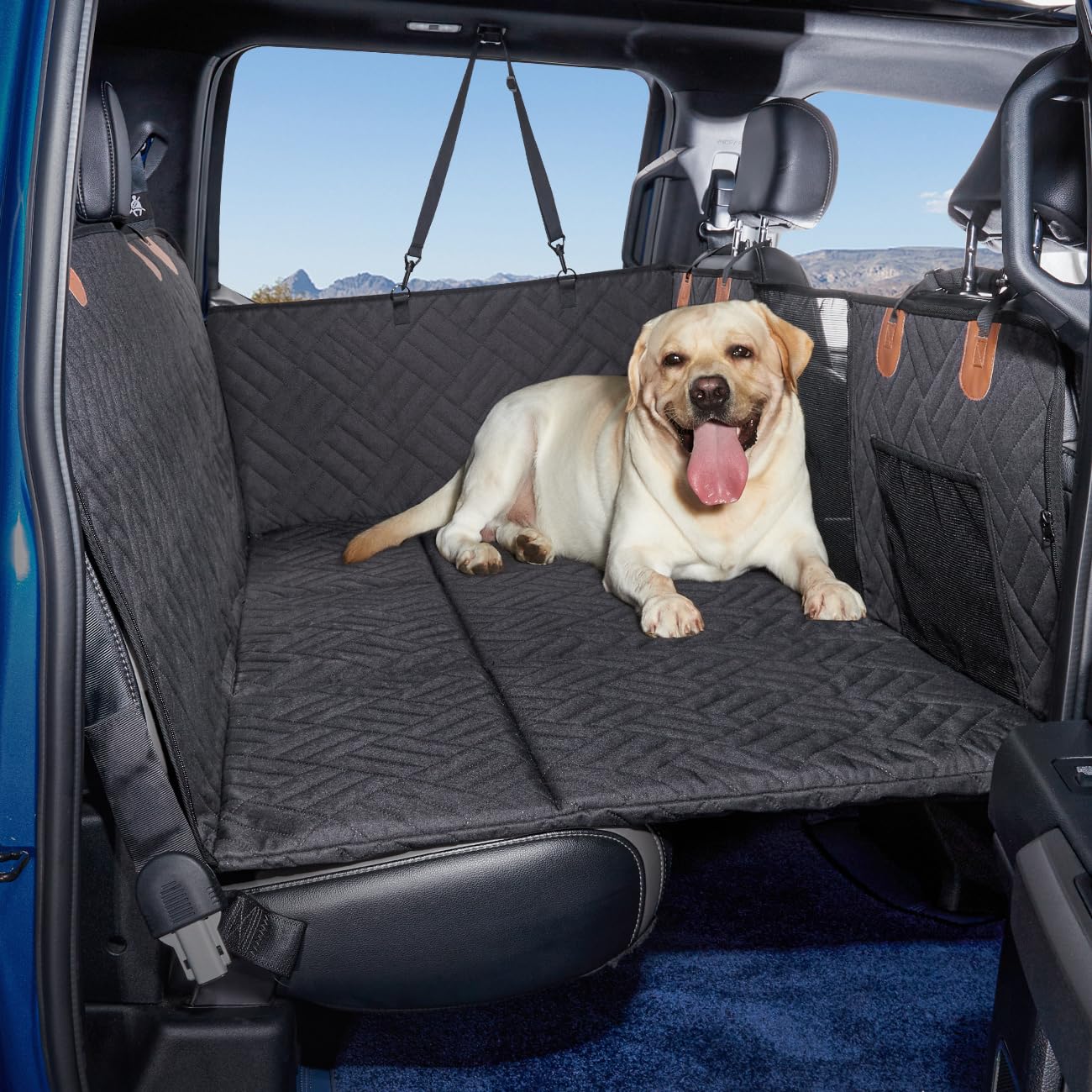 TKYZ Dog Back Seat Extender creates a roomy, secure truck bed space for dogs.