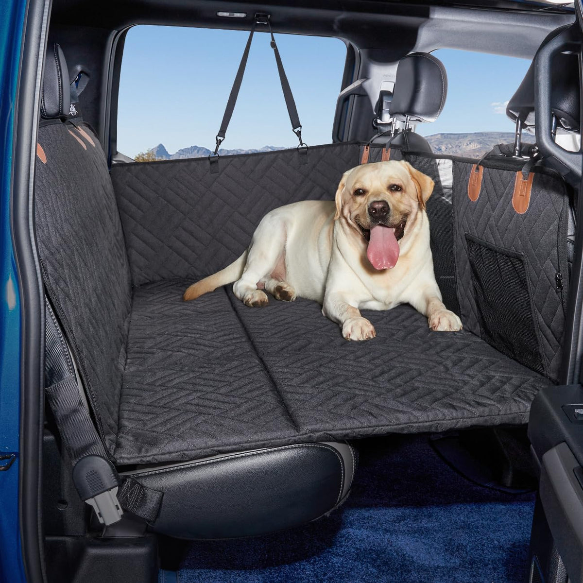 TKYZ Dog Back Seat Extender creates a roomy, secure truck bed space for dogs.