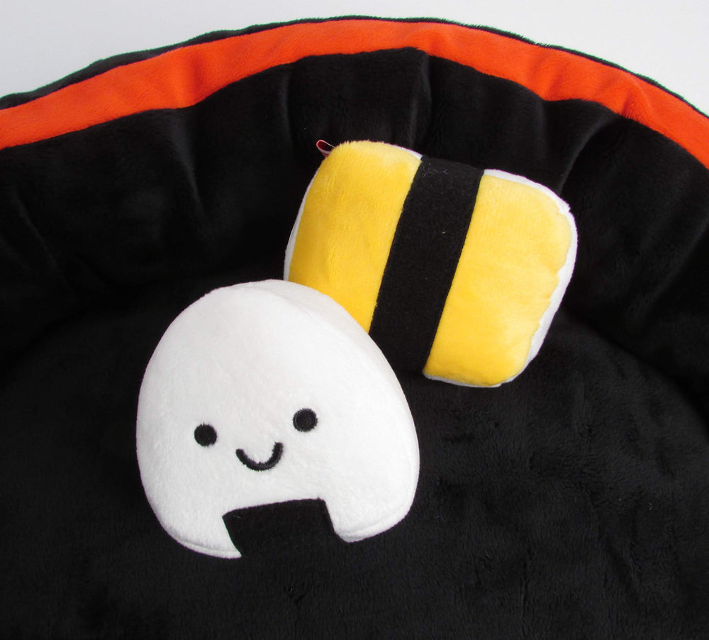 TONBO Onigiri crinkle toy offers interactive play and calm rest.