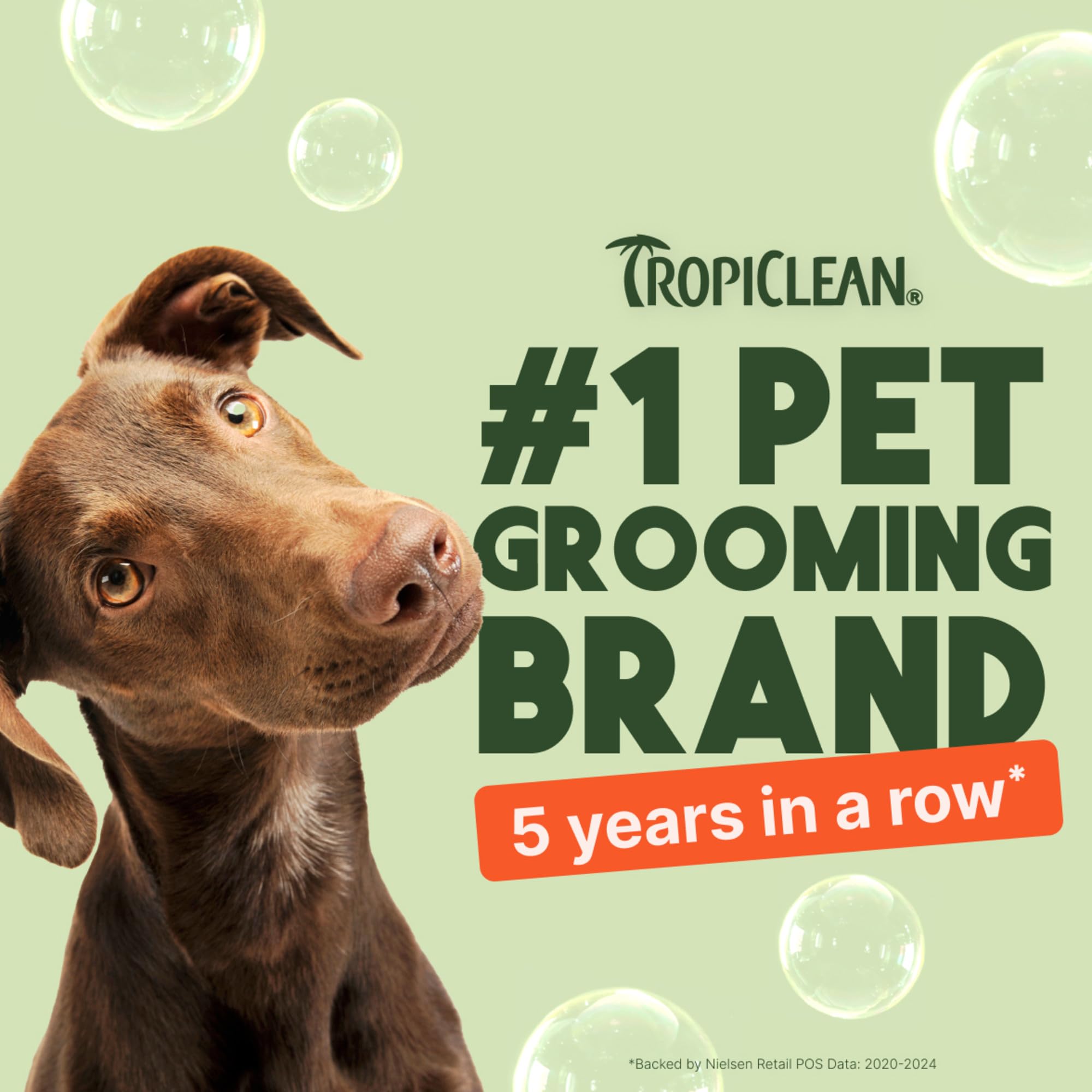 TropiClean 2-in-1 dog shampoo papaya scent bottle delivers tropical freshness.