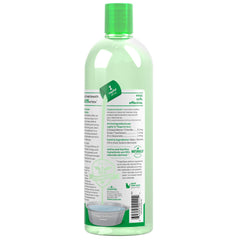 TropiClean Fresh Breath Water Additive being poured for simple daily dosing.
