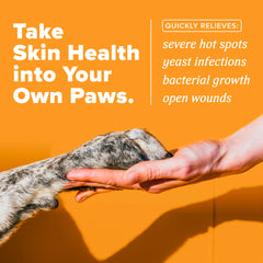 TropiClean HomeVet hot spot closeup with medicated cream contact.