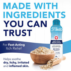 TropiClean Oxymed cat and dog shampoo label mentions medicated oatmeal blend.
