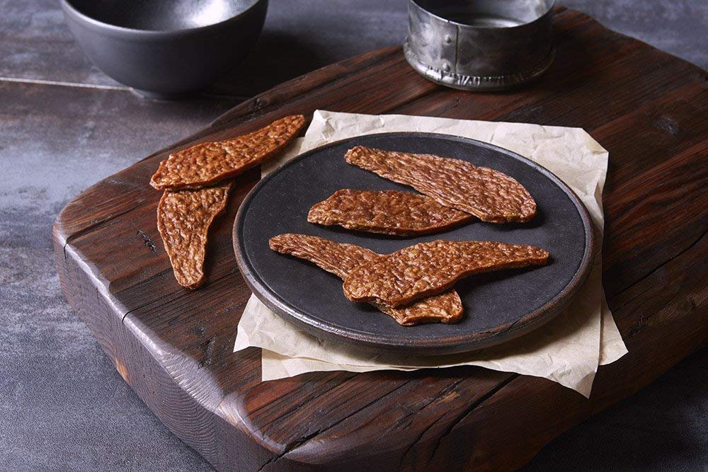 True Chews Premium Jerky Cuts no artificial flavors close-up promoting clean, flavorful dog snacks.