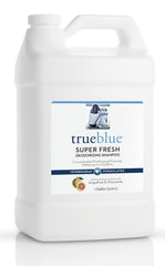 TrueBlue Grapefruit & Chamomile shampoo bottle pour demonstrates tearless cleansing.