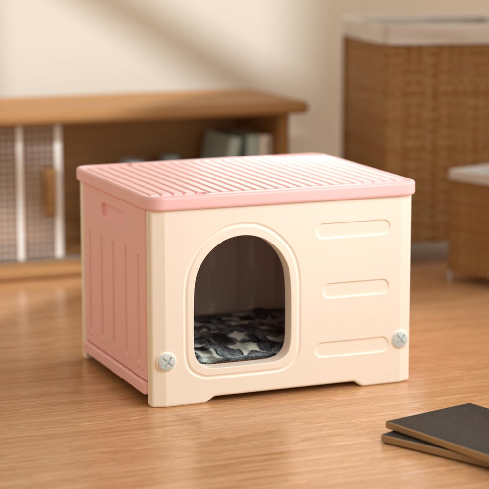 TSEHOOHOO pink plastic cat house adds cheerful visibility to spaces.