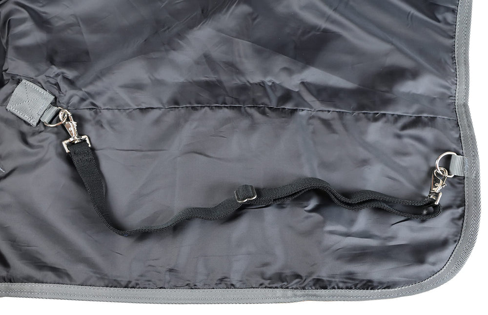 T TEKE Deluxe turnout blanket waterproof breathable shell performs in drizzle and light rain.