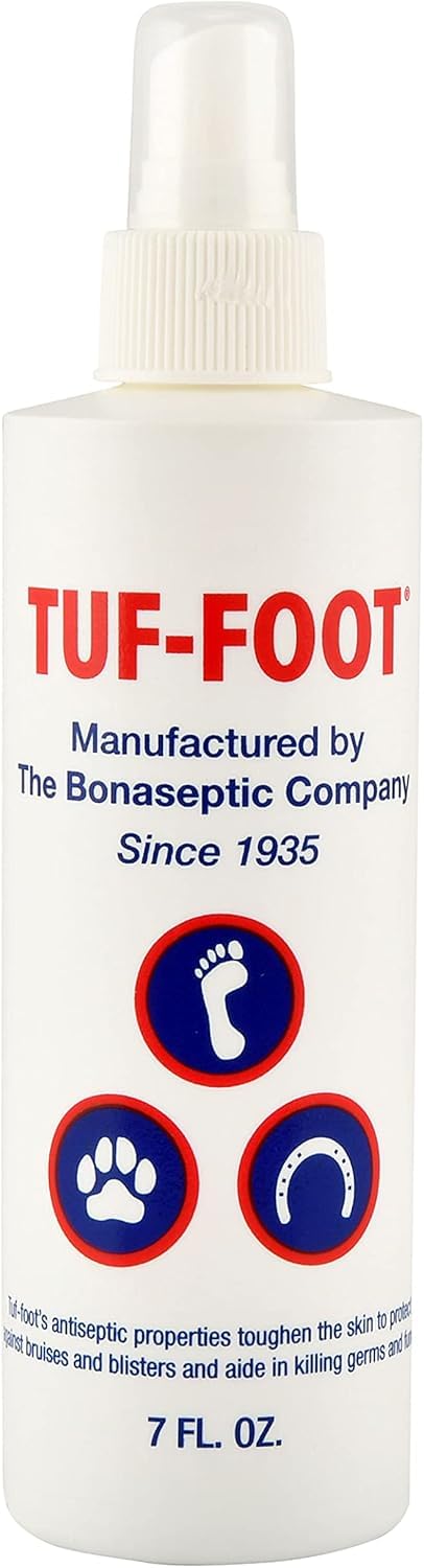 TUF-FOOT bottle 7oz demonstrates paw protection for dogs on rough surfaces.